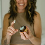 Urb Apothecary’s Solterra Tallow Balm in use, formulated for mature skin to support glow, elasticity, and barrier repair—shown mid-application