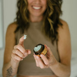 Urb Apothecary’s Solterra Tallow Balm in use, formulated for mature skin to support glow, elasticity, and barrier repair—shown mid-application