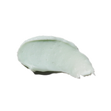 Smooth, pale green swipe of Solterra Tallow Balm, designed to restore radiance, support aging skin, and strengthen the moisture barrier with regenerative botanicals