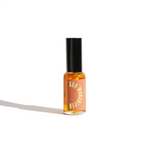 Urb Apothecary Sun Worshiper Serum in amber glass bottle with black pump — antioxidant-rich facial oil designed to brighten, protect, and support radiant aging in sun-exposed skin