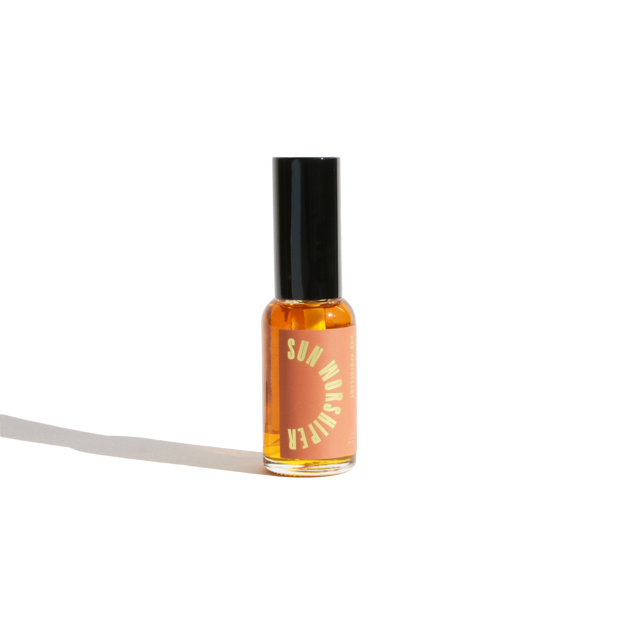 Urb Apothecary Sun Worshiper Serum in amber glass bottle with black pump — antioxidant-rich facial oil designed to brighten, protect, and support radiant aging in sun-exposed skin