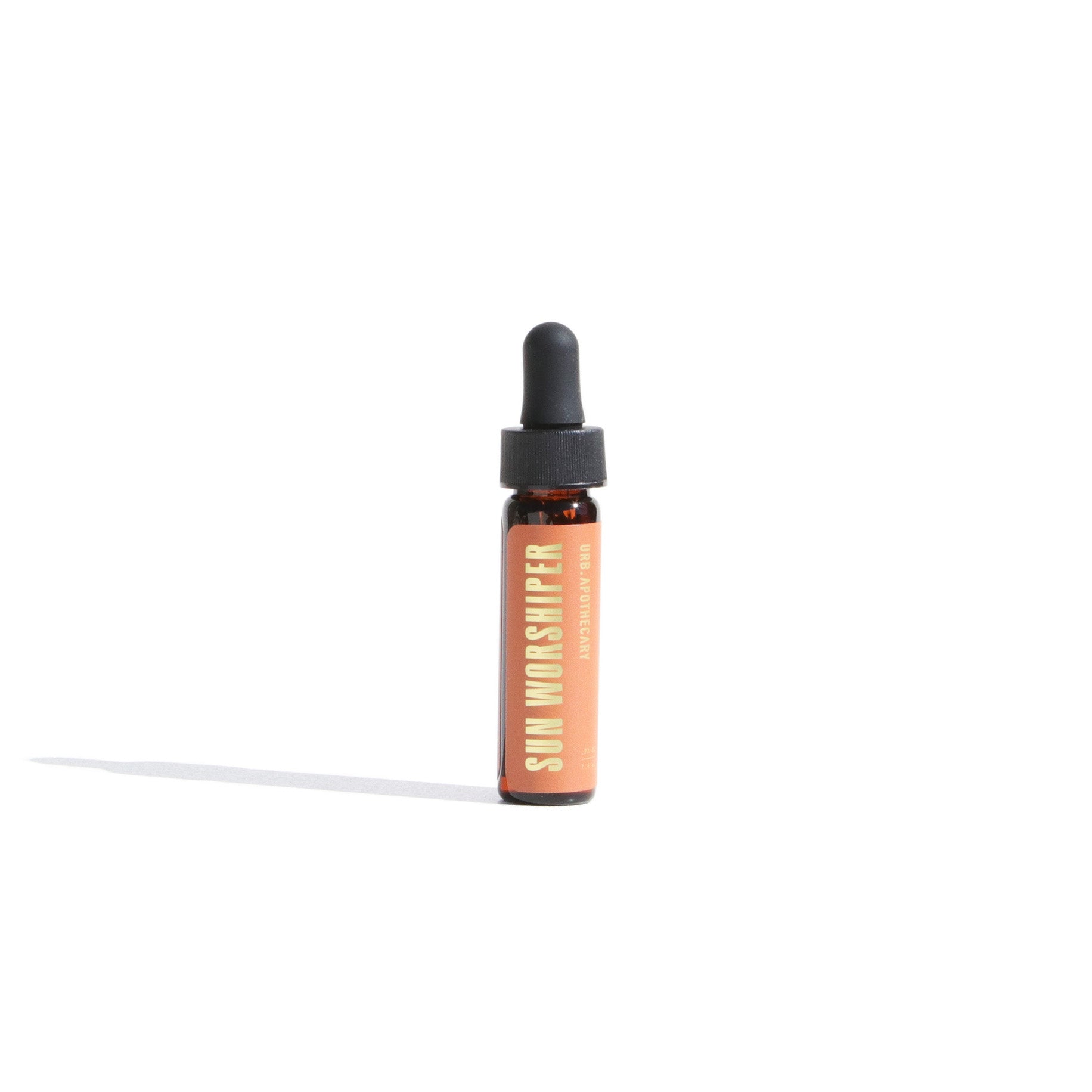 Mini vial of Urb Apothecary Sun Worshiper Serum — travel-size antioxidant facial oil ideal for sampling, on-the-go hydration, and sun-exposed skin protection